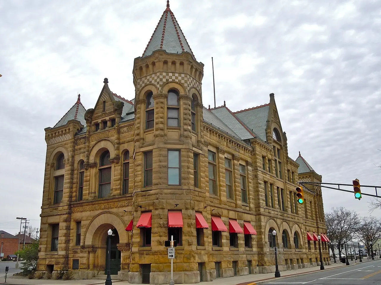 The History Center in Fort Wayne’s former City Hall, with its stone tower and red awnings, photographed in 2011.