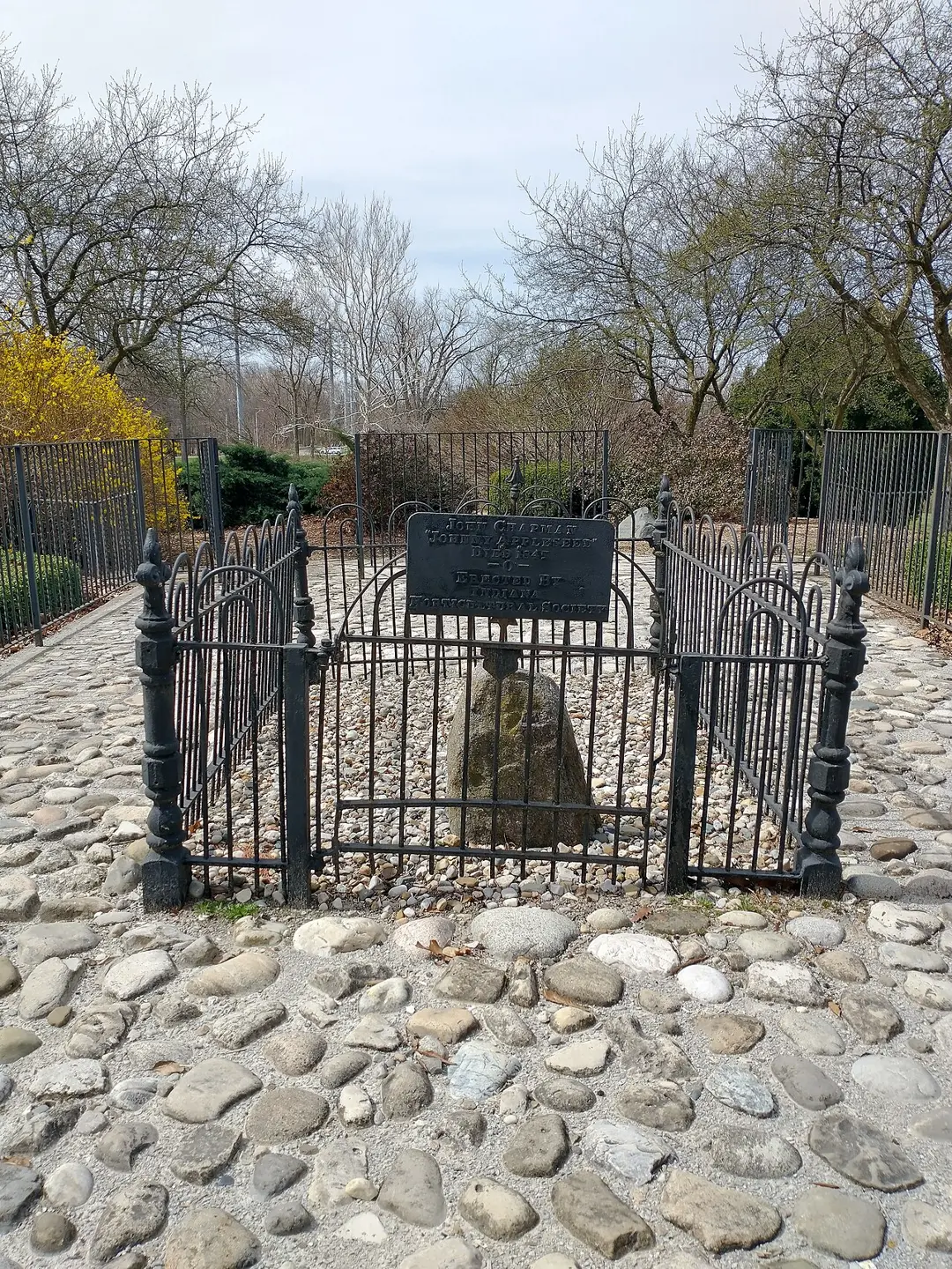 The Johnny Appleseed gravesite memorial inside Johnny Appleseed Park, photographed in March 2021.